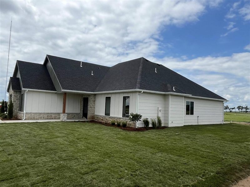 New sod laid around a newly built home near Colwich, Kansas